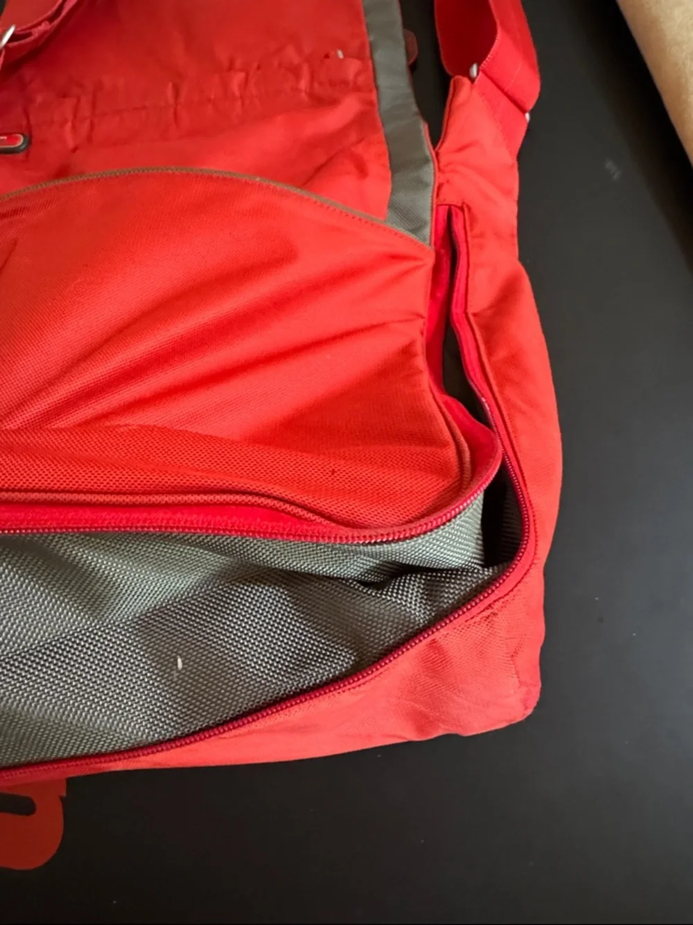 Tumi Red Messenger Bag with Gray Accent. Expandable. Laptop section.